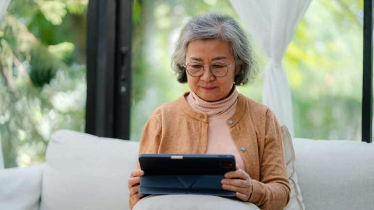older woman on tablet gettyimages 2184879678 WnXp2L