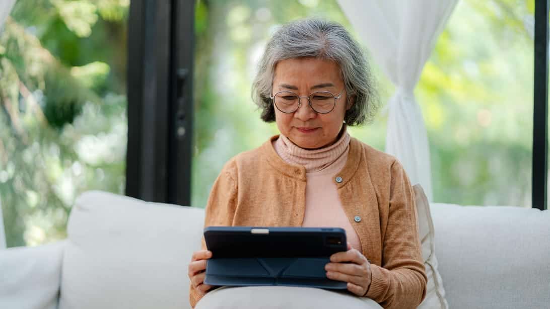 Popular Chinese 'Are You Dead?' Safety App Changes Name 1 older woman on tablet gettyimages 2184879678 WnXp2L